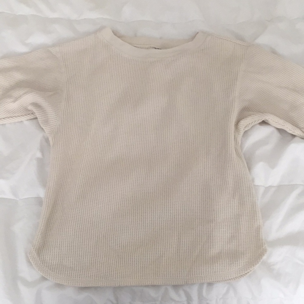 cream colored half long sleeve